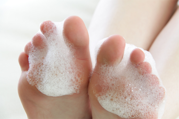 Cleanse Feet With Antibacterial Solution